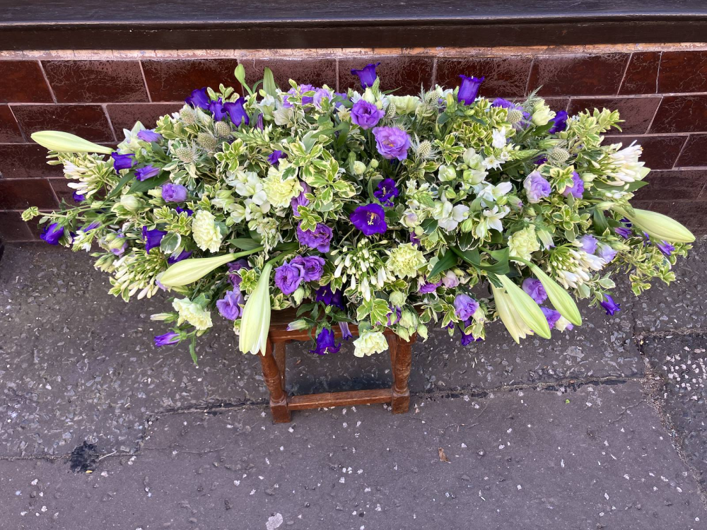 Violet Meadow Casket Spray